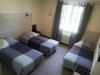 Chambre triple — Hôtel Le Clamador